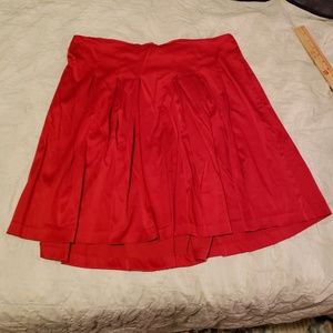 Torrid red pleated skirt, silky and shiny.